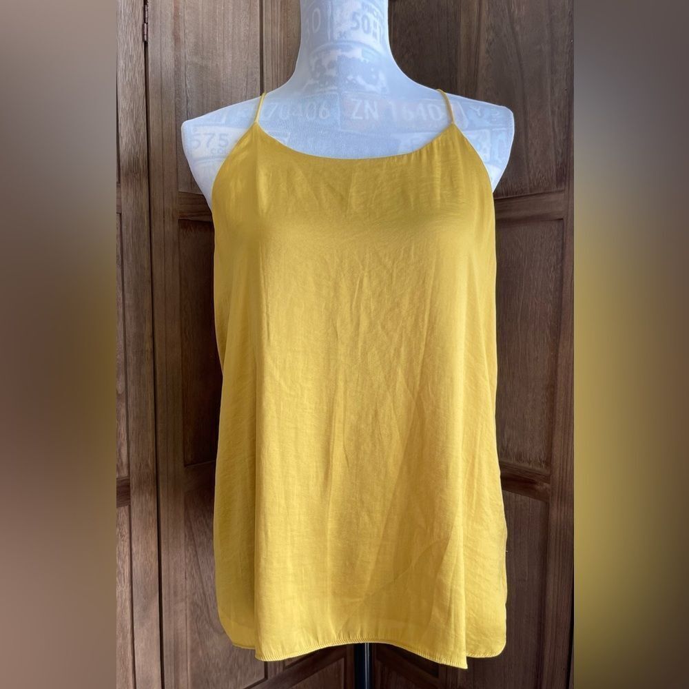 Women’s Naked Zebrz razorback silky tank blouse.